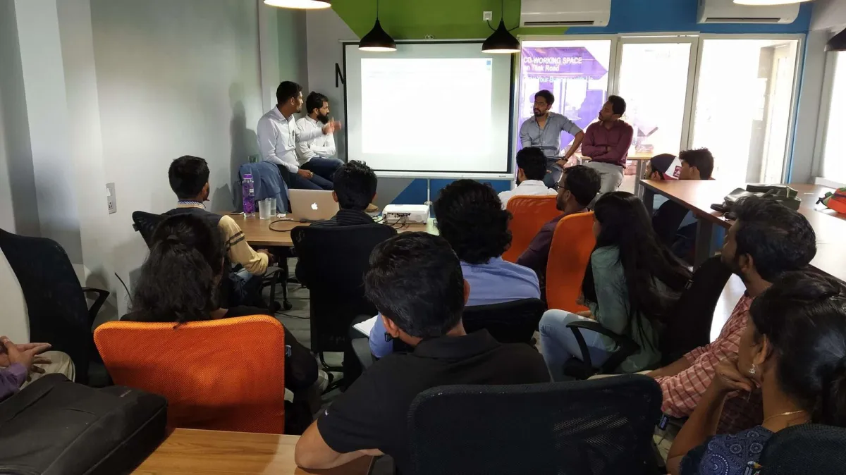 Shared office space in Pune with desks and modern office design